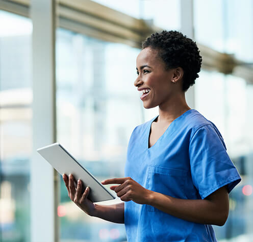 nurse pointing to tablet