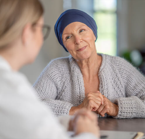 cancer patient talking to doctor